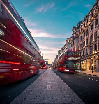 London city stree with buses moving fast