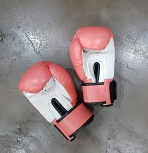This case emphasises the importance of a claimant taking the necessary steps to prove that a defendant is legally responsible for online negative reviews; circumstantial evidence alone is insufficient. The Defamation Act 2013 requires that a claimant demonstrate that the publication of a defamatory statement has caused or is likely to cause serious harm to their reputation. boxing gloves confrontation
