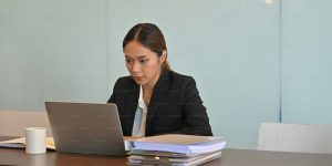 Revoking sponsor licence taylor hampton solicitors photo of woman at computer